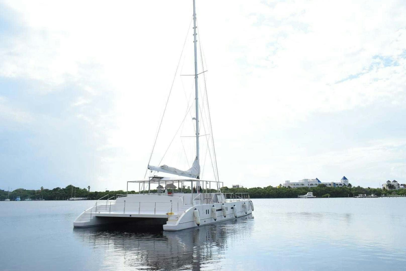 a sailboat on the water aboard COMPASS Yacht for Sale