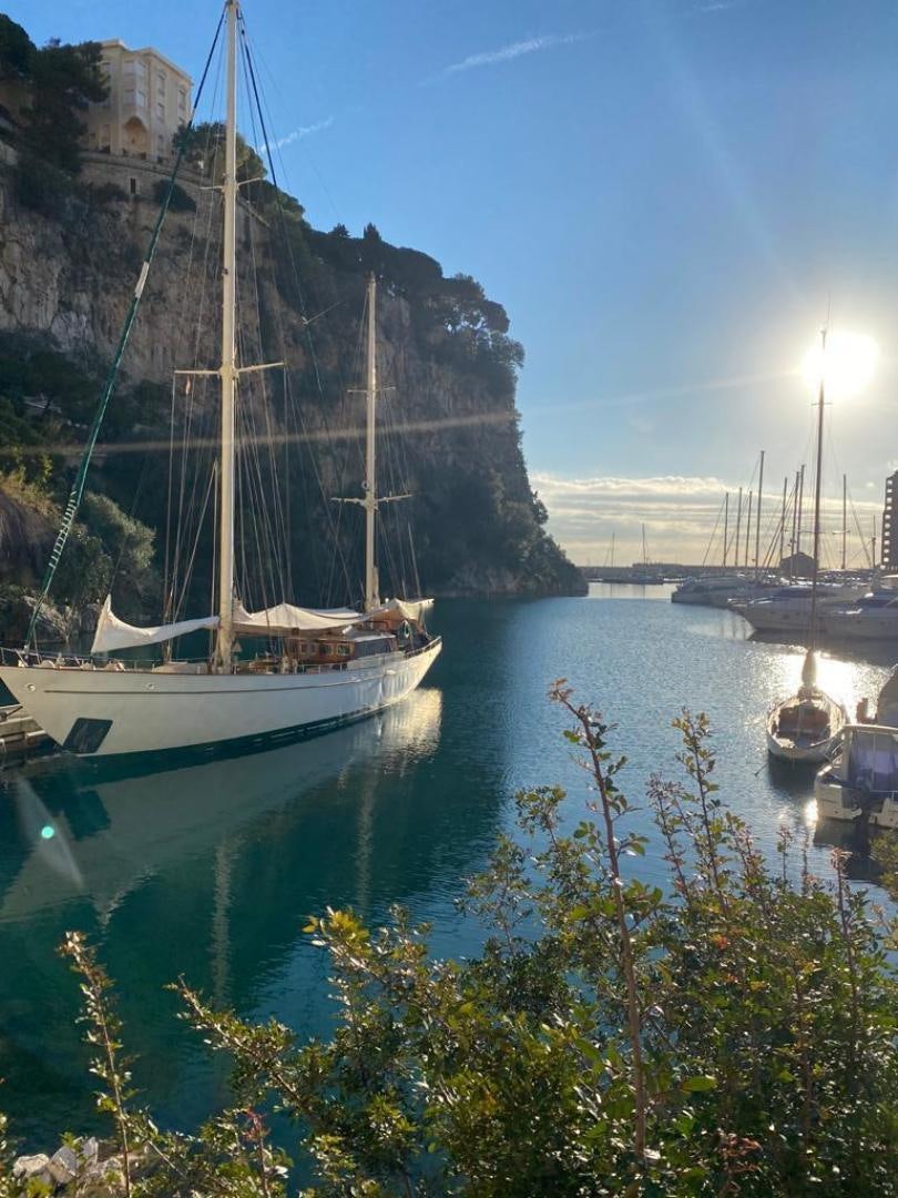 a boat is parked in the water aboard TAMORY Yacht for Sale