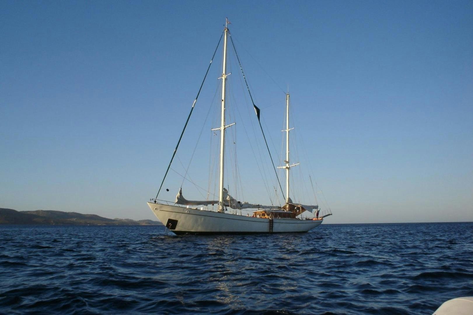 a sailboat in the water aboard TAMORY Yacht for Sale