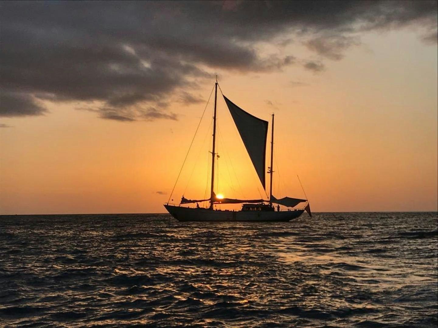 a sailboat in the ocean aboard TAMORY Yacht for Sale