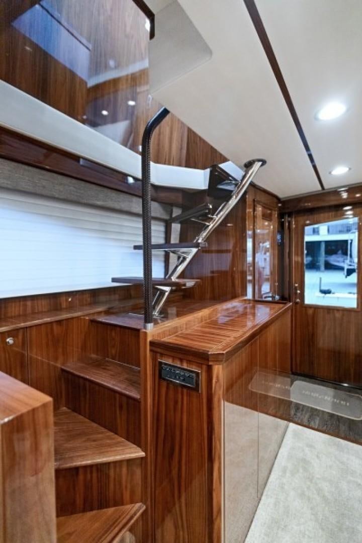 a wooden staircase with a ladder aboard REEL GOOD TIME Yacht for Sale