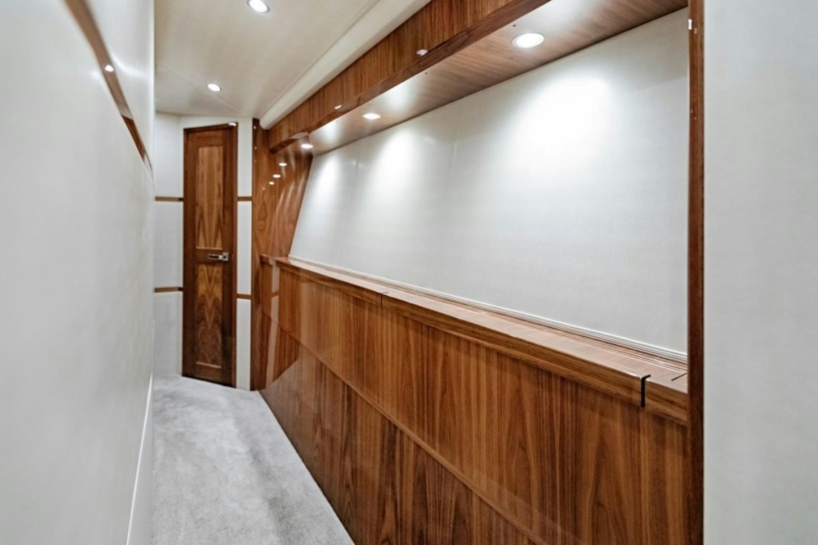 a room with wooden cabinets aboard REEL GOOD TIME Yacht for Sale