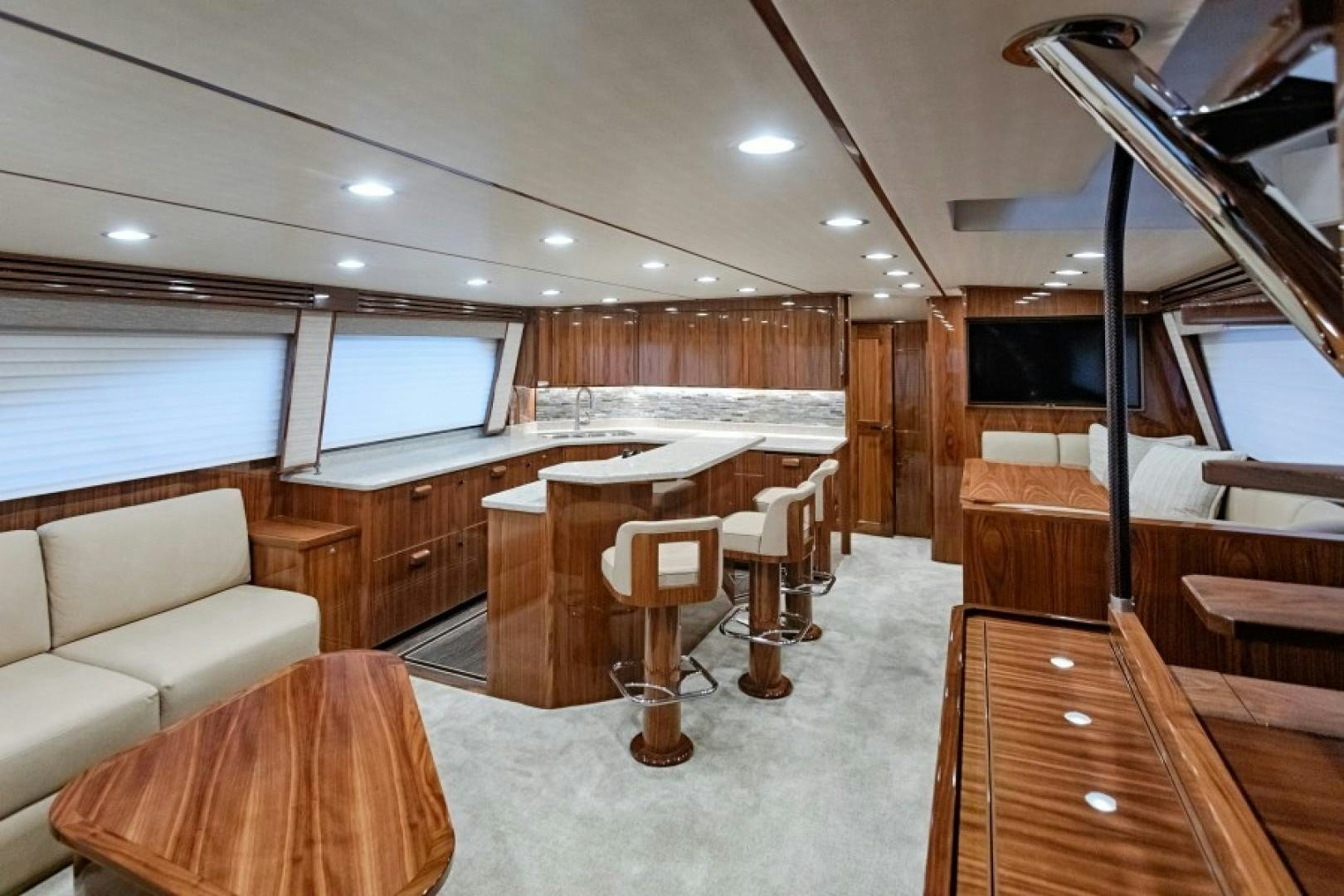 a room with a bed and a desk aboard REEL GOOD TIME Yacht for Sale