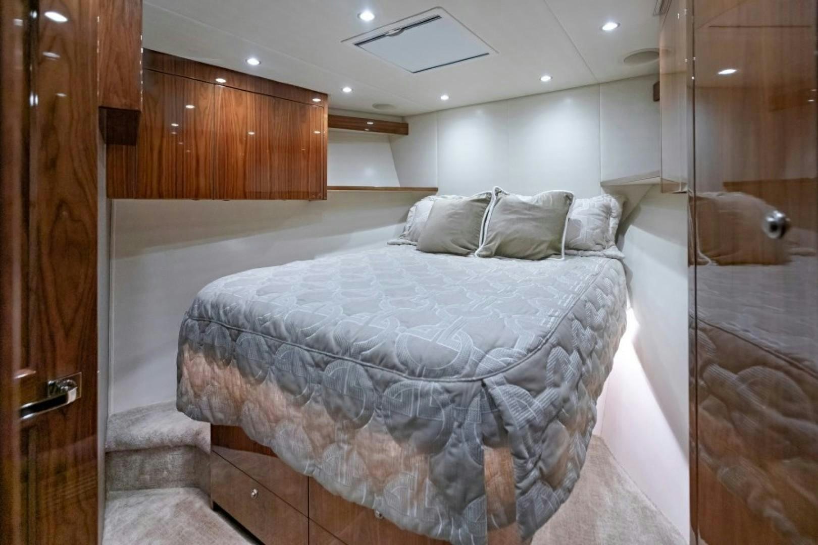 a bed in a room aboard REEL GOOD TIME Yacht for Sale