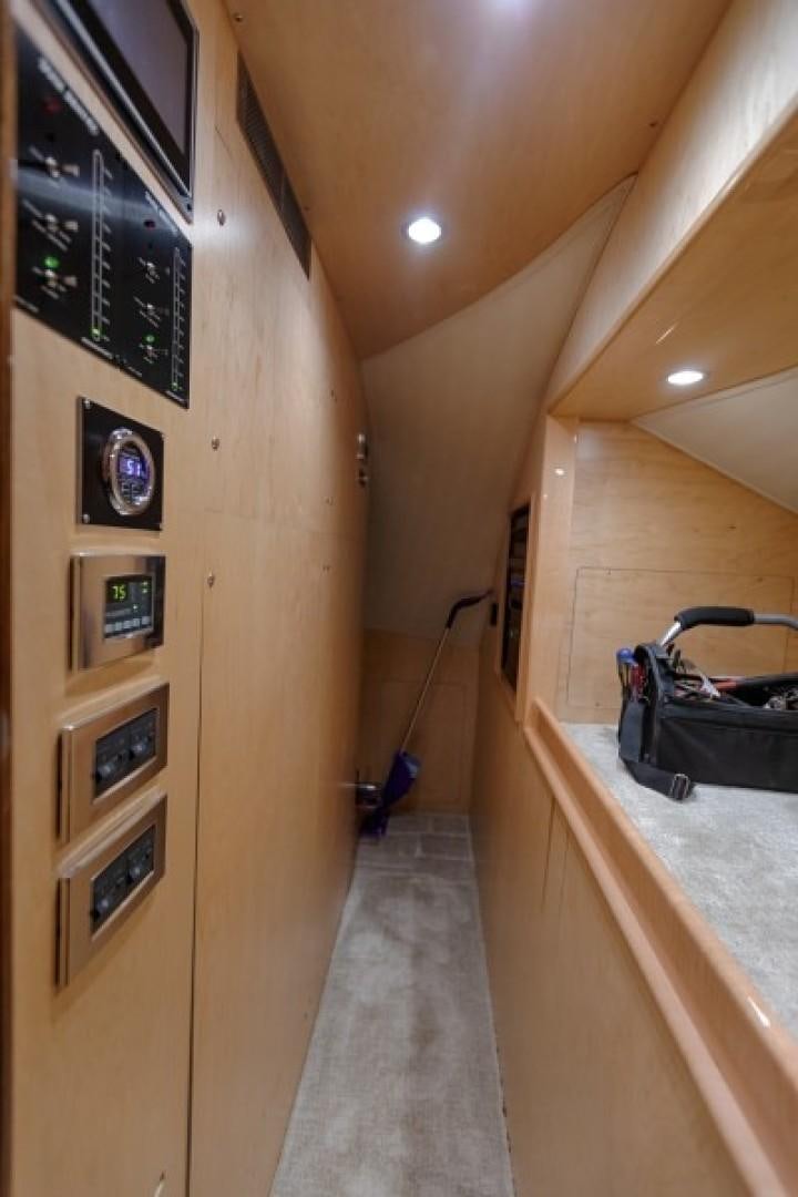 a hallway with a sink and a large mirror aboard REEL GOOD TIME Yacht for Sale