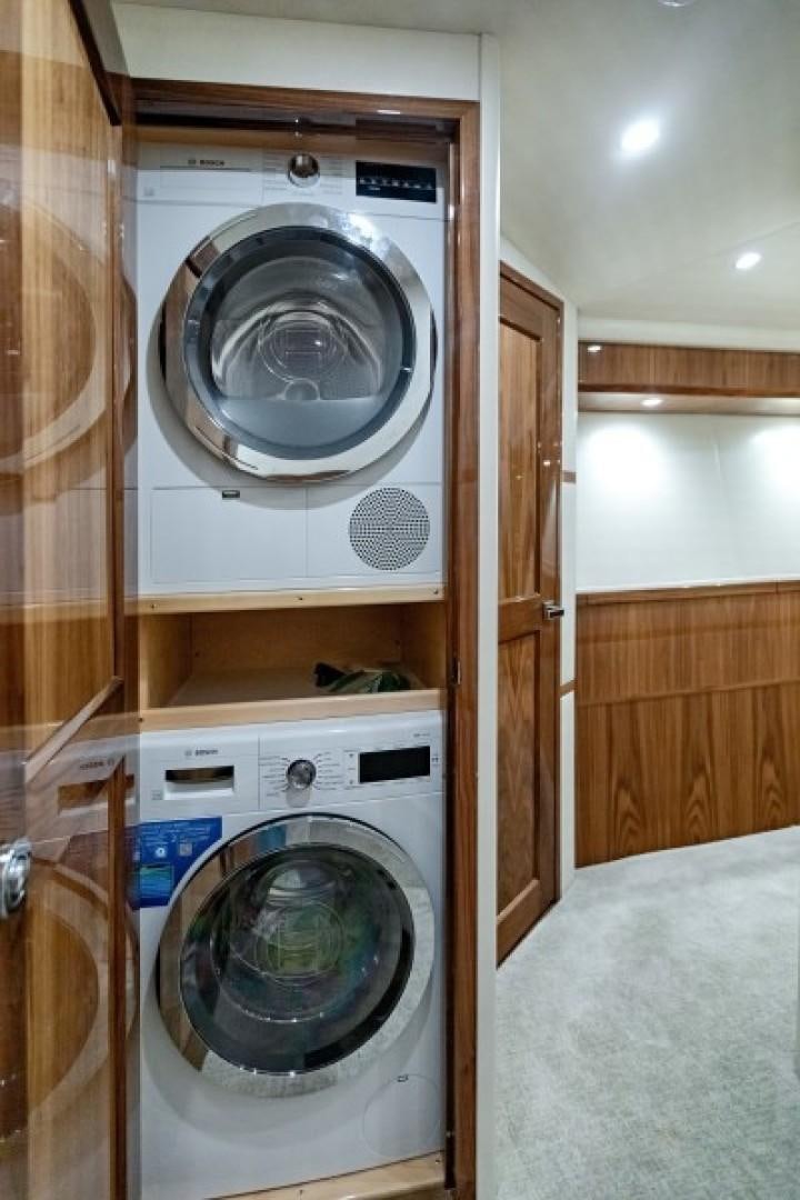 a washer and dryer in a room aboard REEL GOOD TIME Yacht for Sale