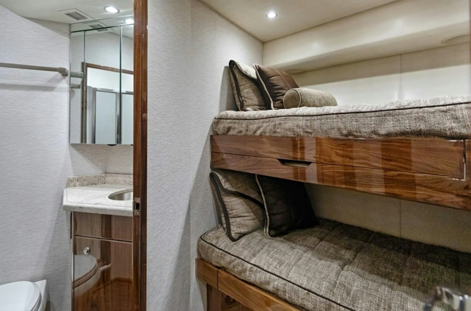 a bathroom with a large bed aboard REEL GOOD TIME Yacht for Sale