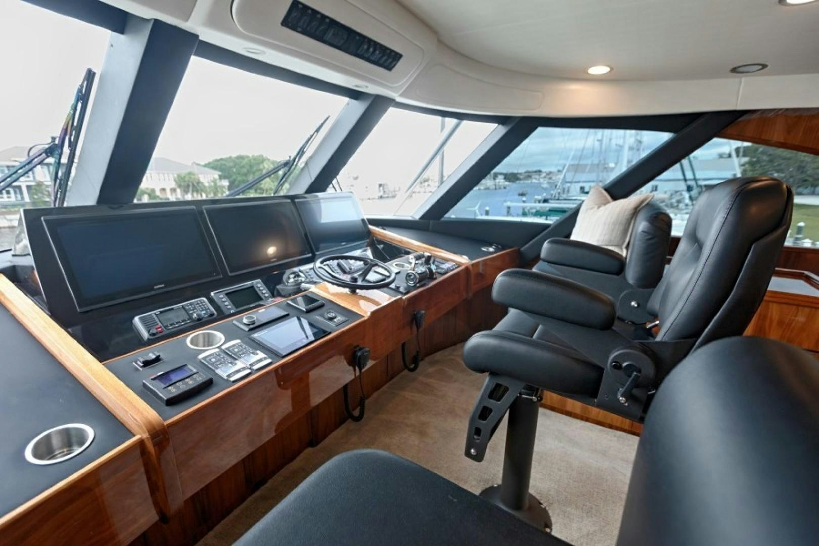 inside of a car with a large screen and a large window aboard REEL GOOD TIME Yacht for Sale