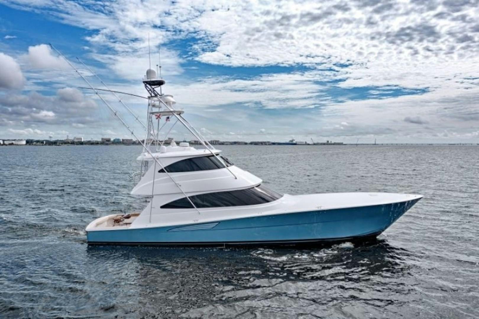 a white boat in the water aboard REEL GOOD TIME Yacht for Sale