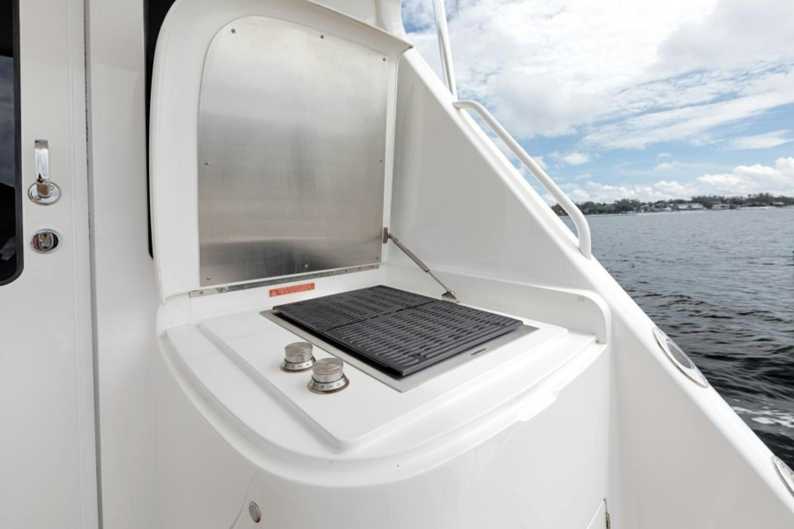 a laptop on a boat aboard REEL GOOD TIME Yacht for Sale