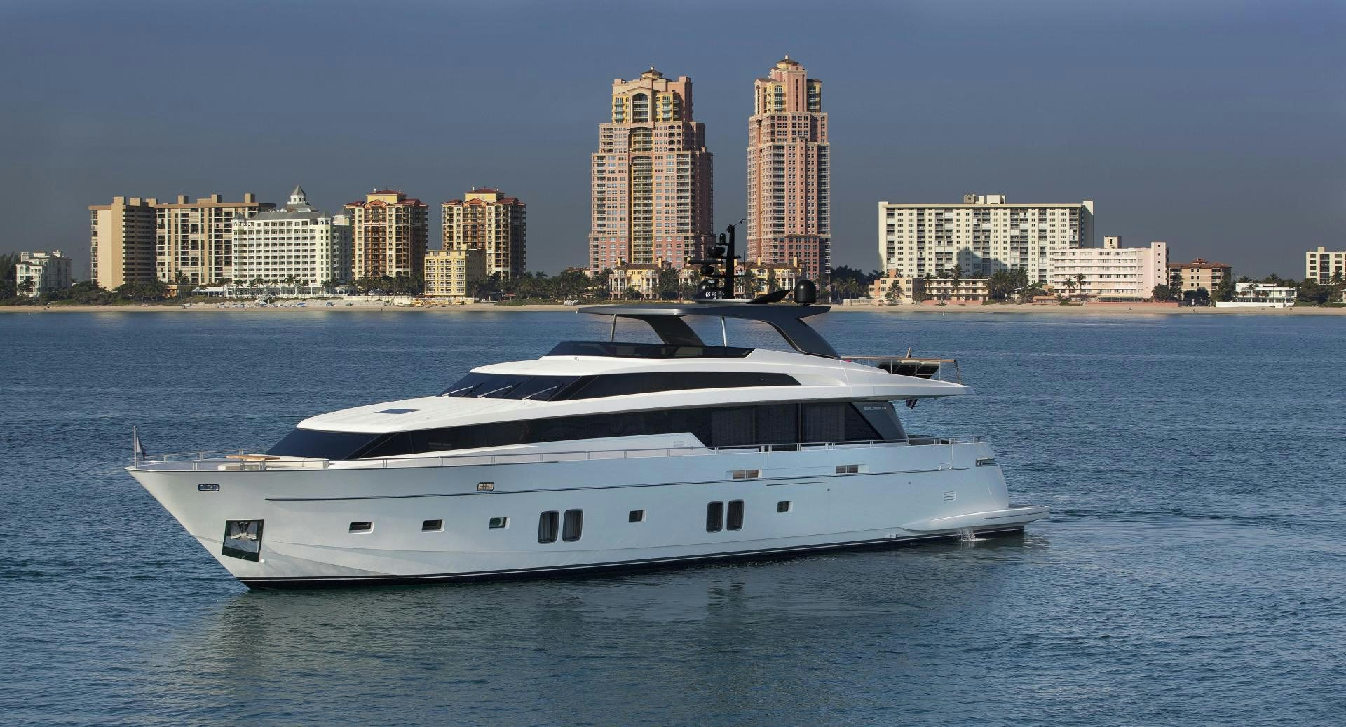 a white yacht in the water aboard BODACIOUS Yacht for Sale