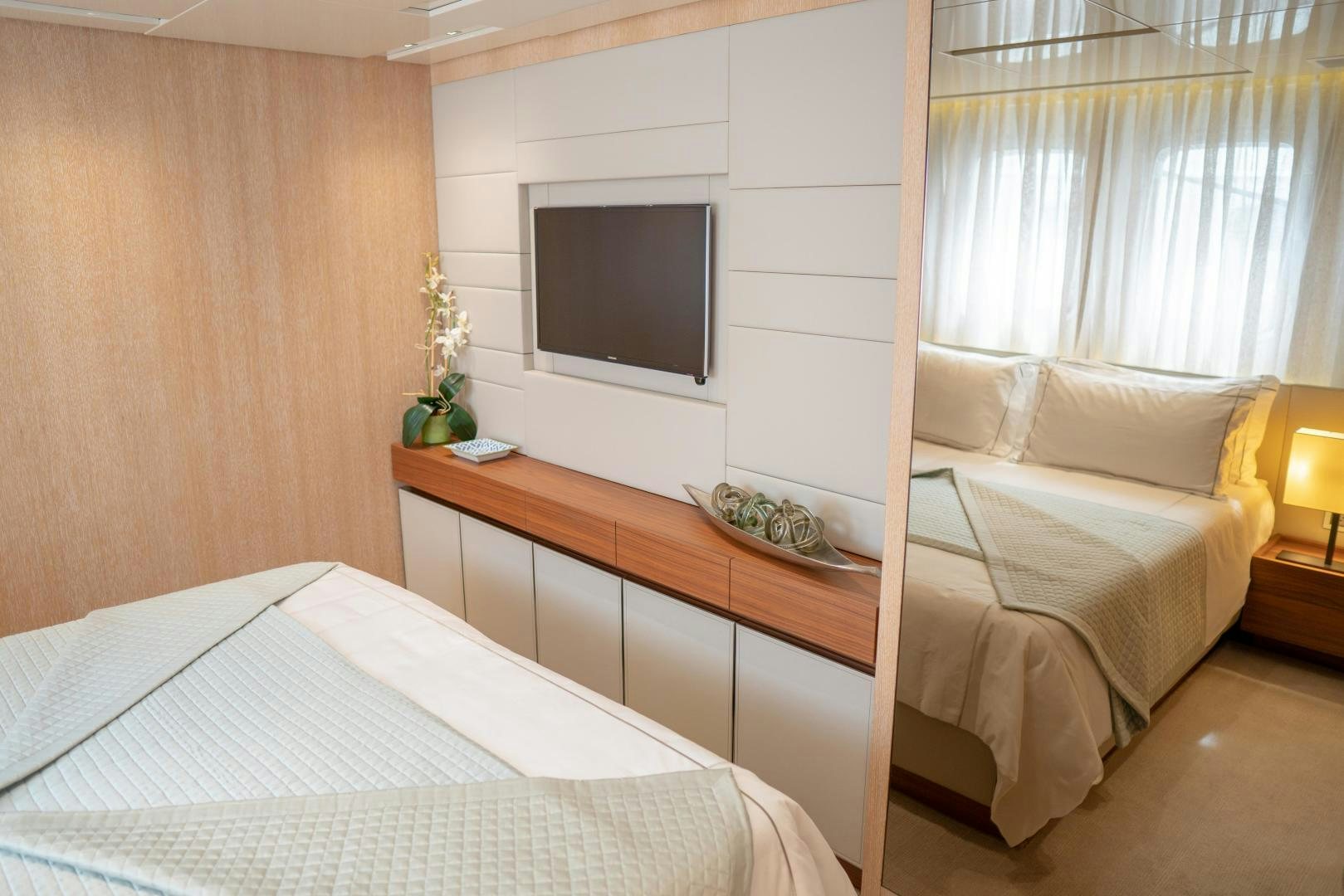 a room with two beds aboard BODACIOUS Yacht for Sale