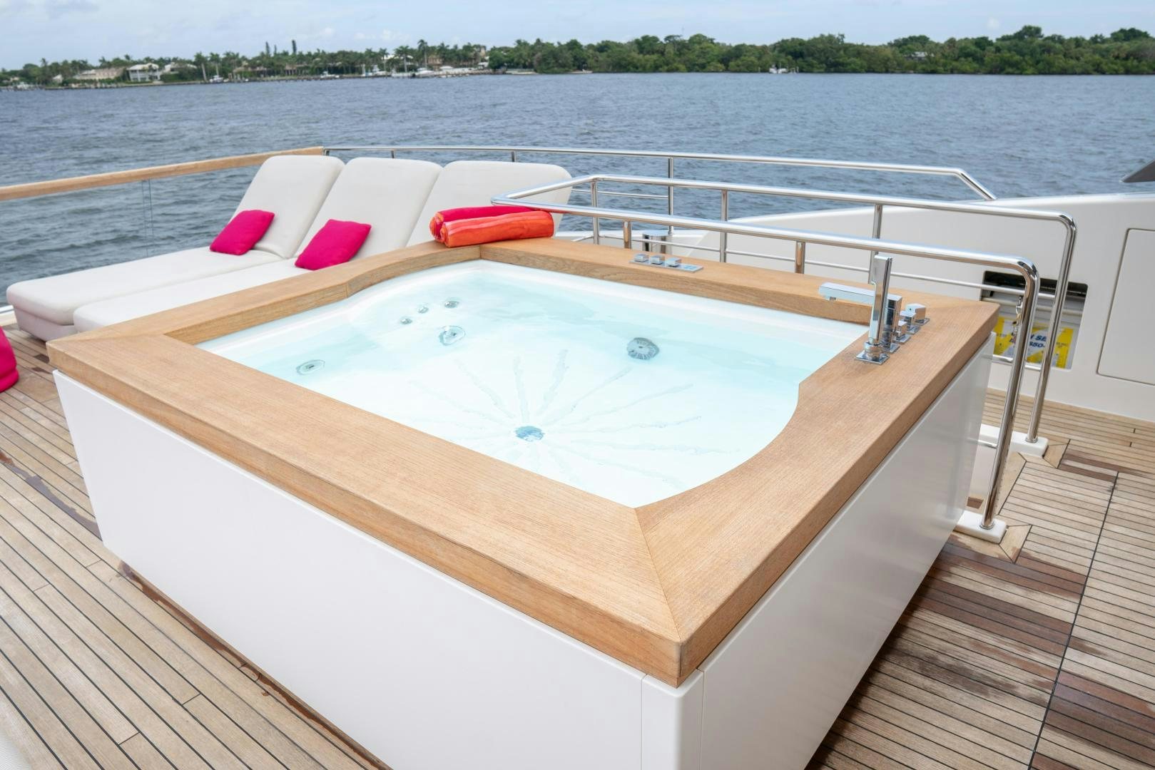 a boat on a deck aboard BODACIOUS Yacht for Sale
