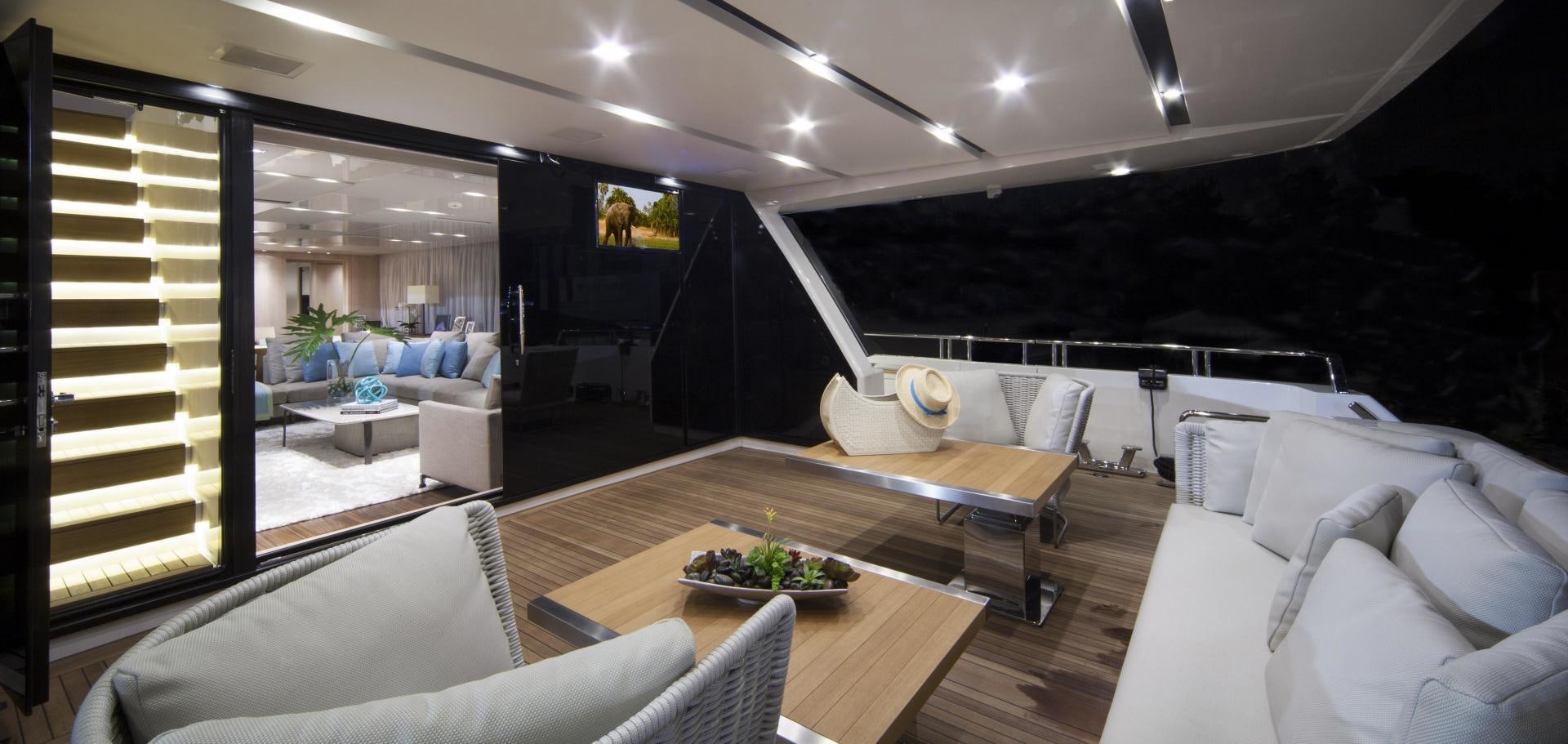 a living room with a large window aboard BODACIOUS Yacht for Sale