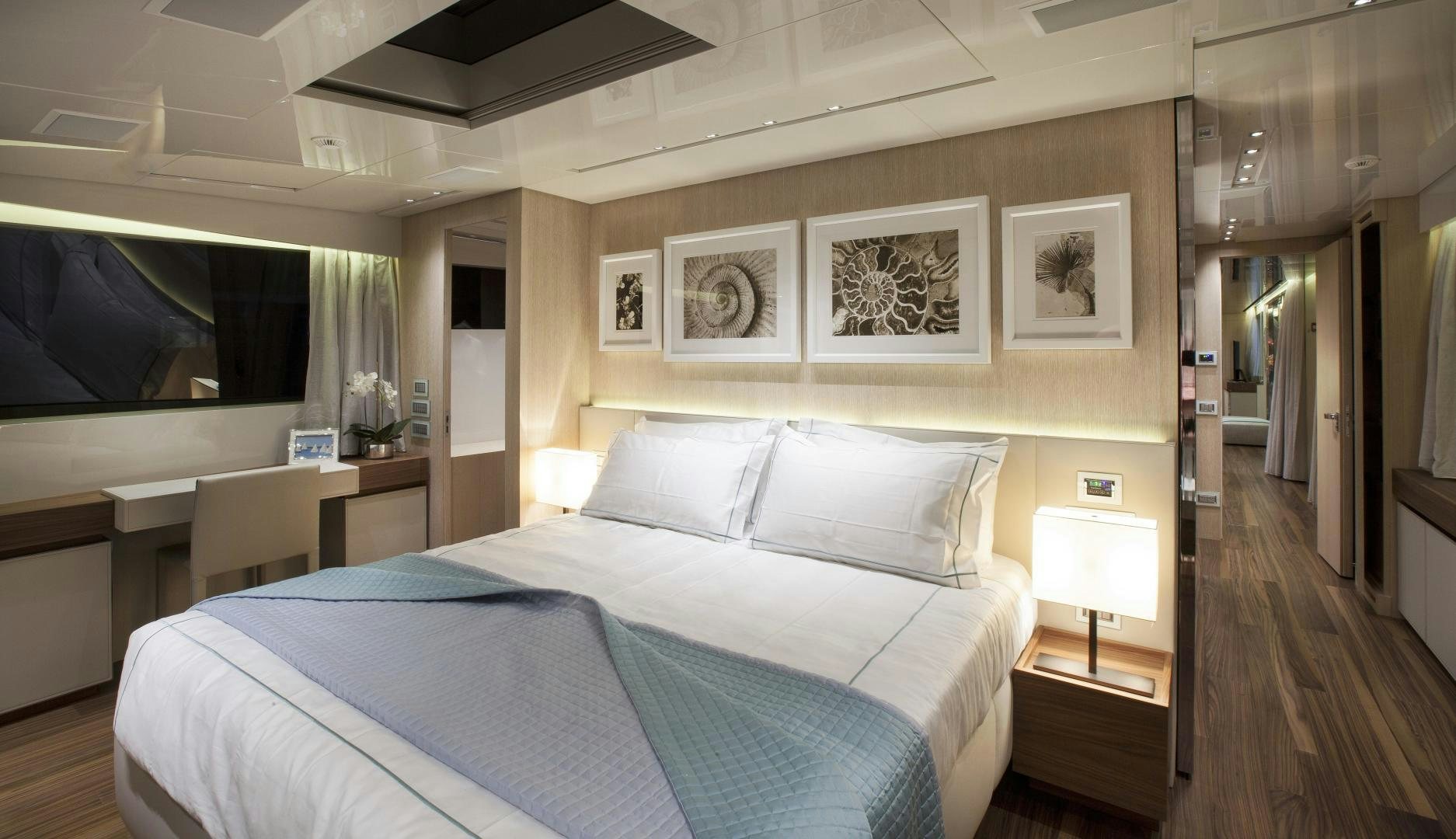a bed in a hotel room aboard BODACIOUS Yacht for Sale
