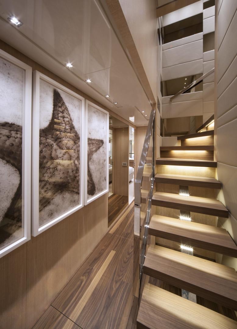 a room with a large mirror aboard BODACIOUS Yacht for Sale