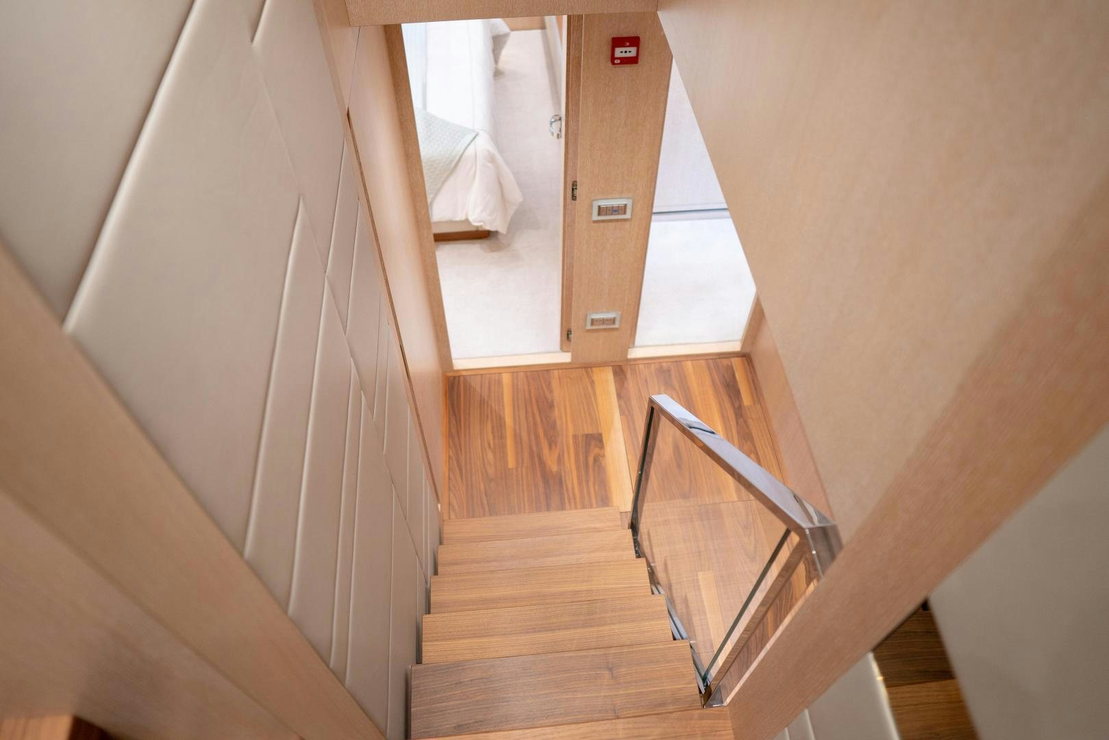 a staircase with a railing aboard BODACIOUS Yacht for Sale