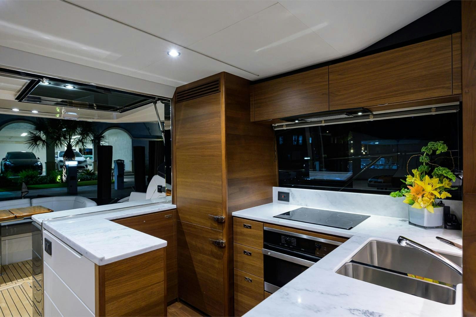 a kitchen with a sink and cabinets aboard GREAT NEWS Yacht for Sale