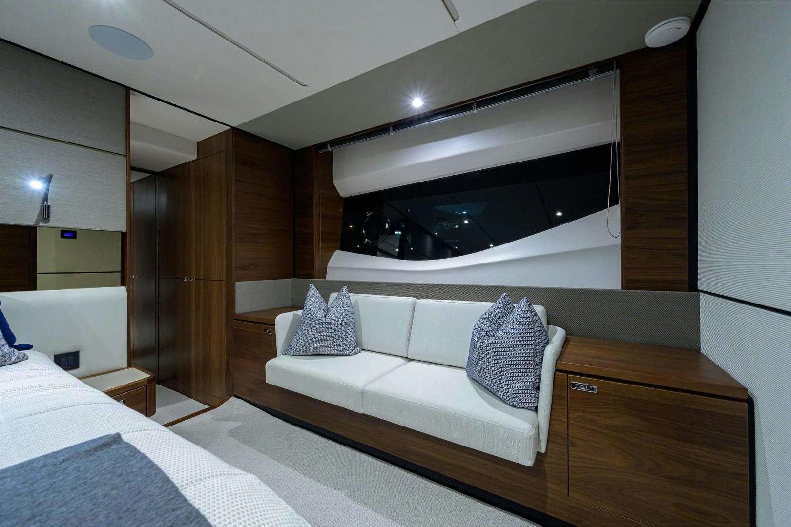 a room with a bed and a television aboard GREAT NEWS Yacht for Sale