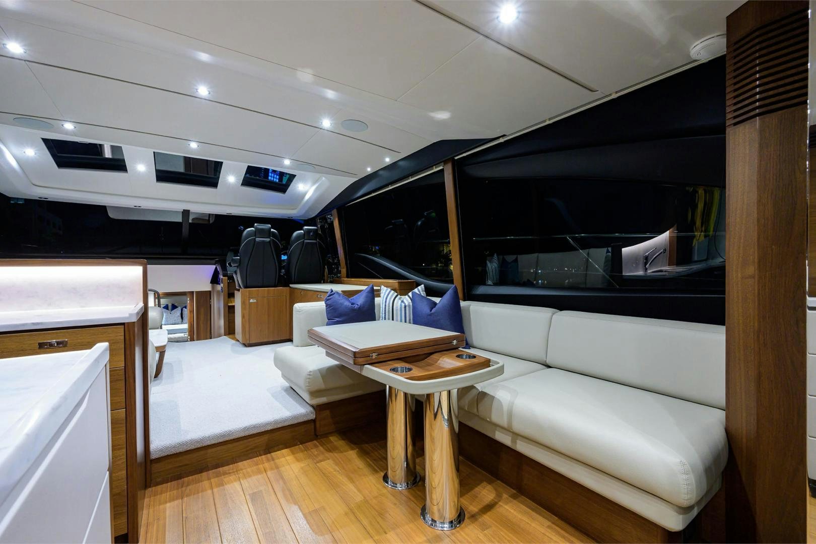 a living room with a couch and a television aboard GREAT NEWS Yacht for Sale