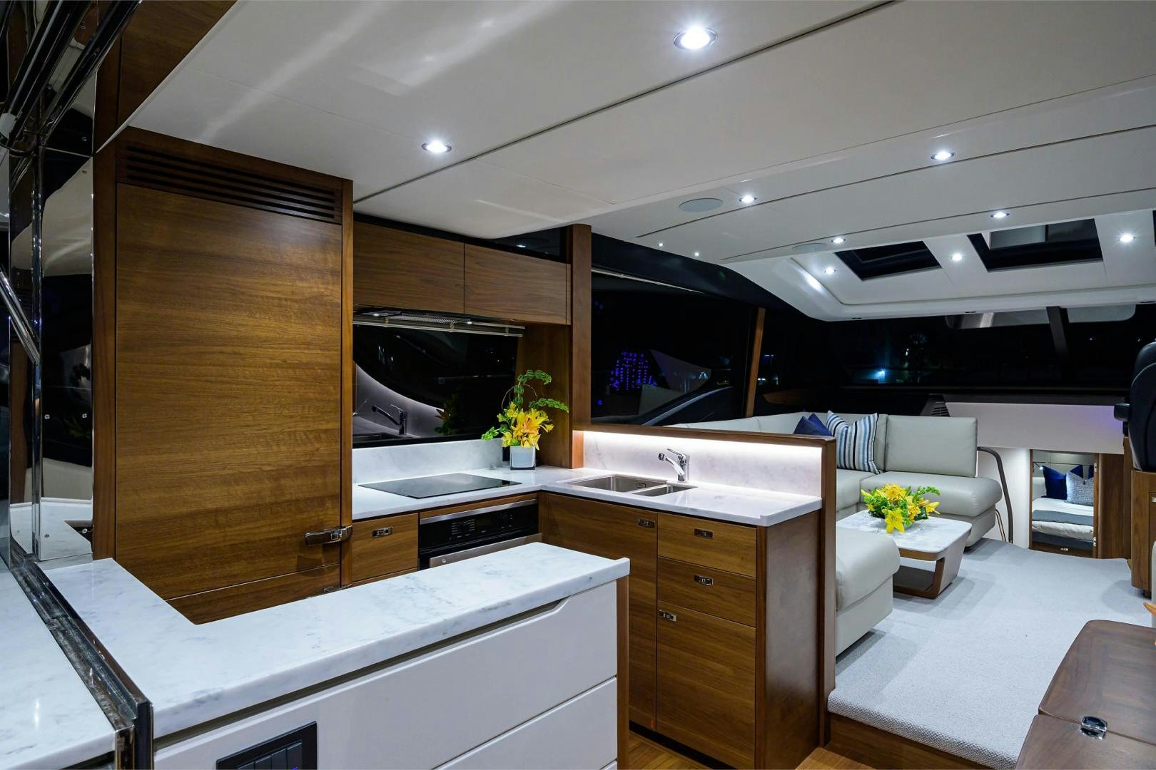 a kitchen with a large refrigerator aboard GREAT NEWS Yacht for Sale
