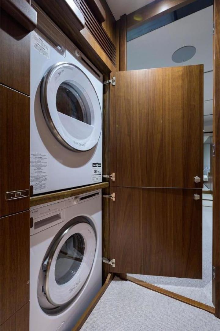 a washer and dryer in a room aboard GREAT NEWS Yacht for Sale
