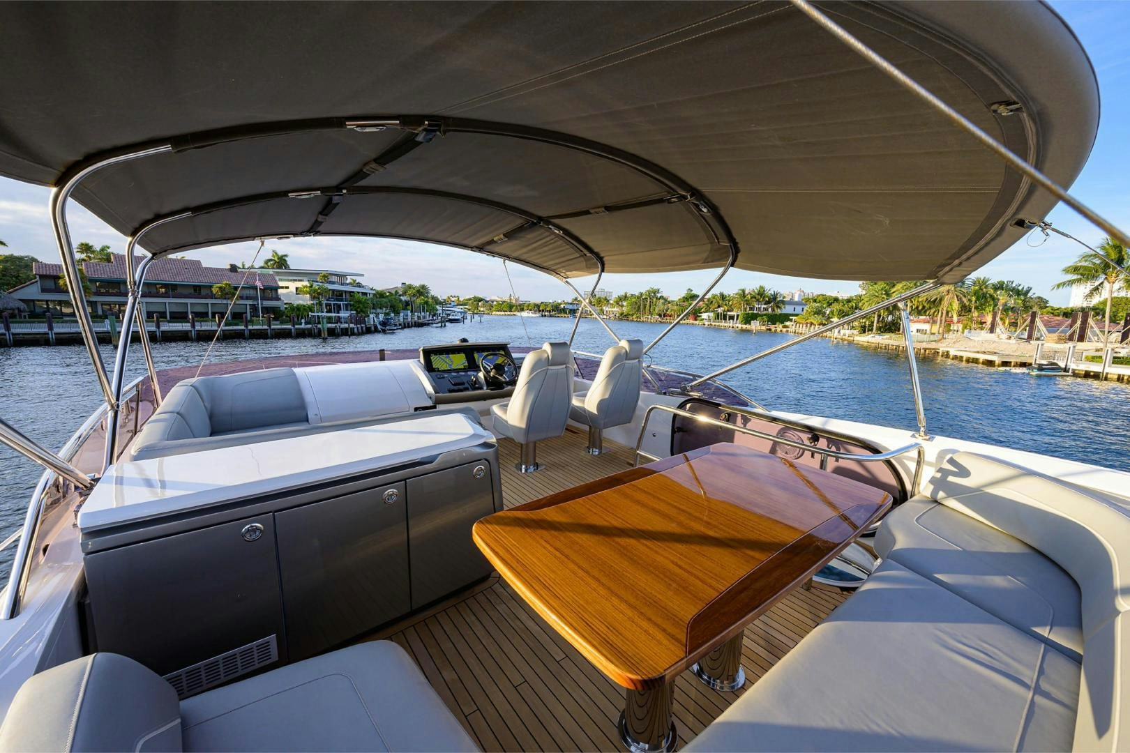a boat with a table and chairs on it aboard GREAT NEWS Yacht for Sale