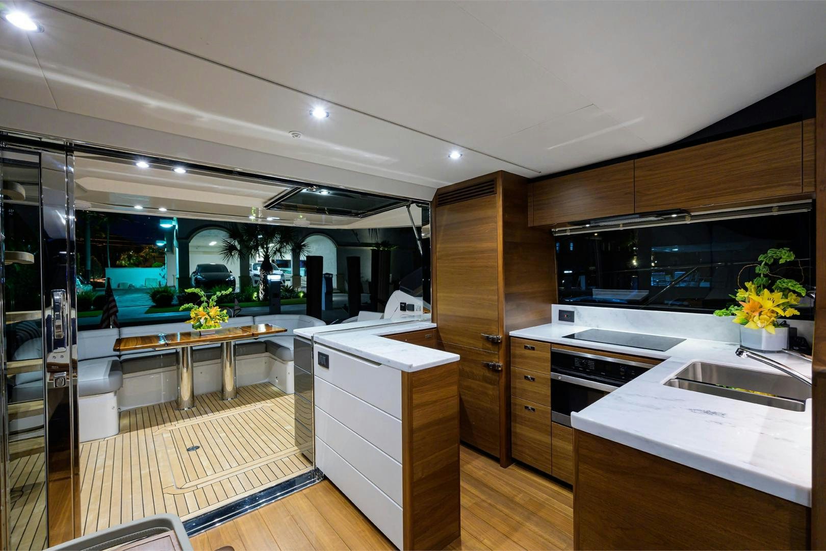 a kitchen with a large glass window aboard GREAT NEWS Yacht for Sale