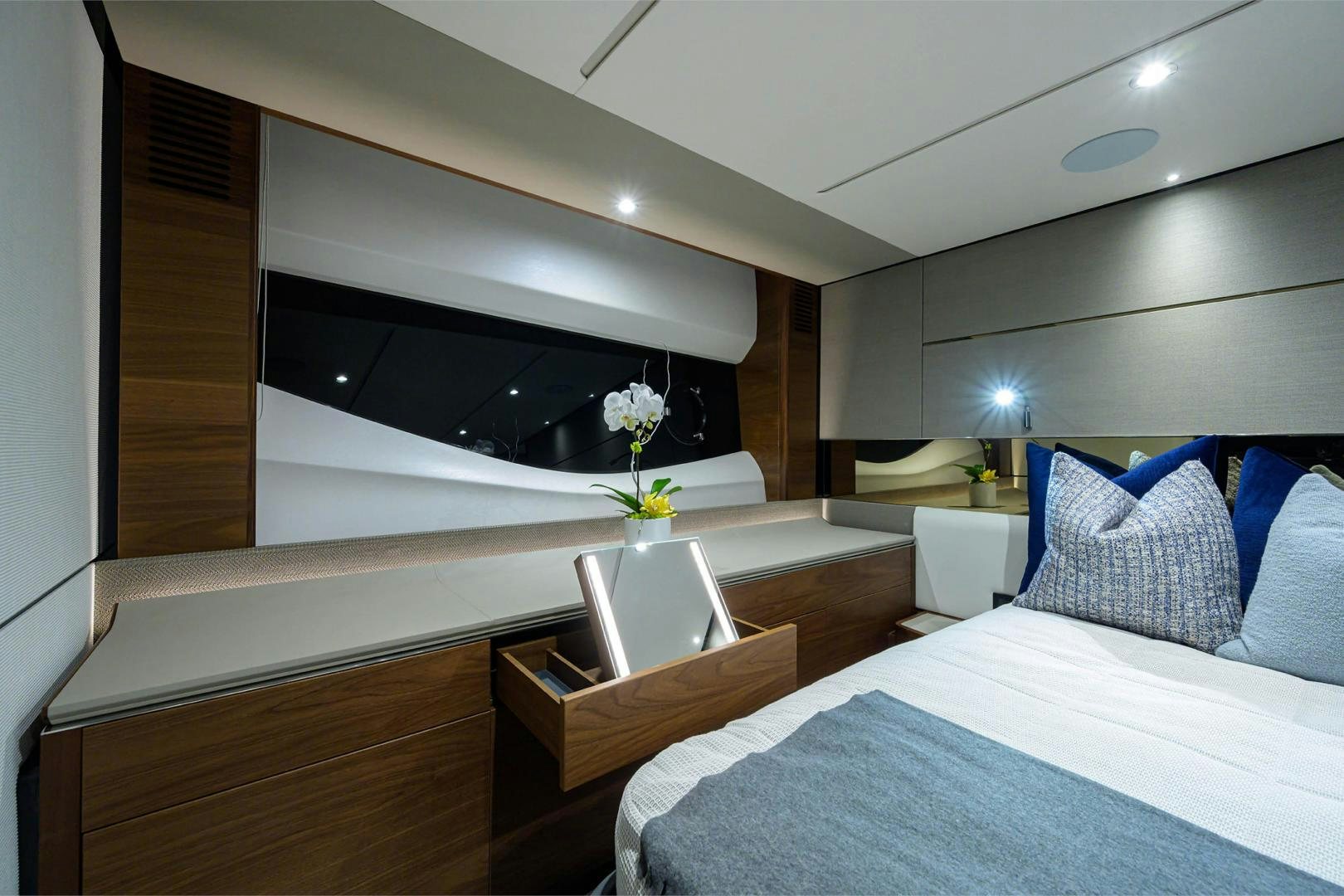 a room with a bed and a table aboard GREAT NEWS Yacht for Sale