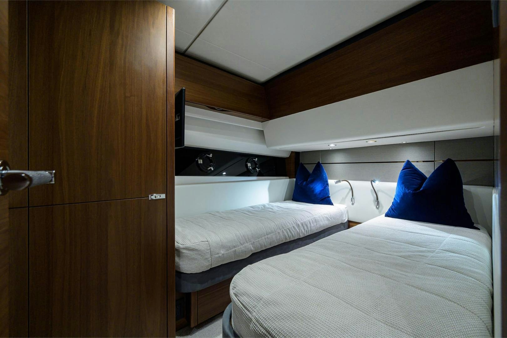 a room with a couple of beds aboard GREAT NEWS Yacht for Sale