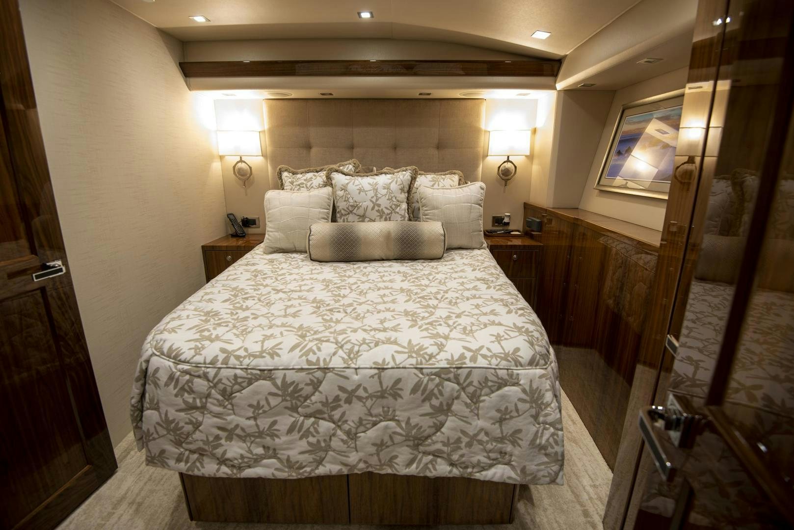 a large bed in a hotel room aboard TAG TEAM Yacht for Sale