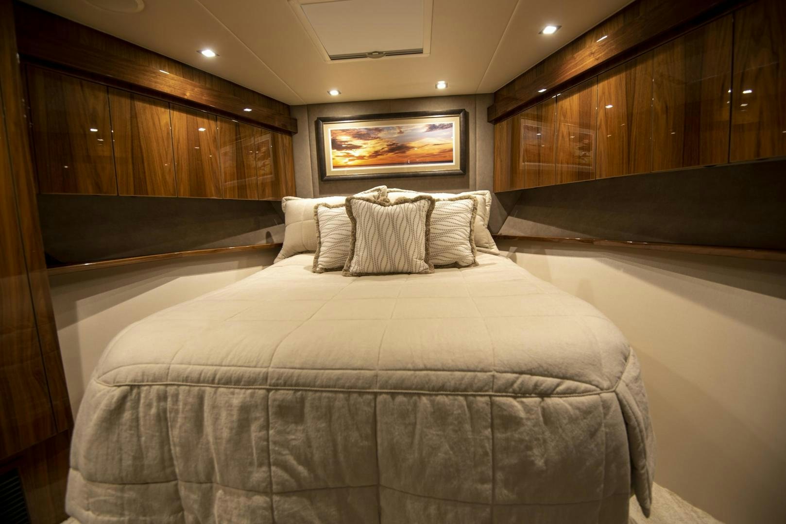 a bed with white sheets aboard TAG TEAM Yacht for Sale