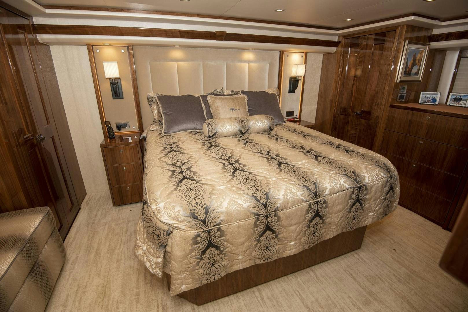 a large bed in a room aboard TAG TEAM Yacht for Sale