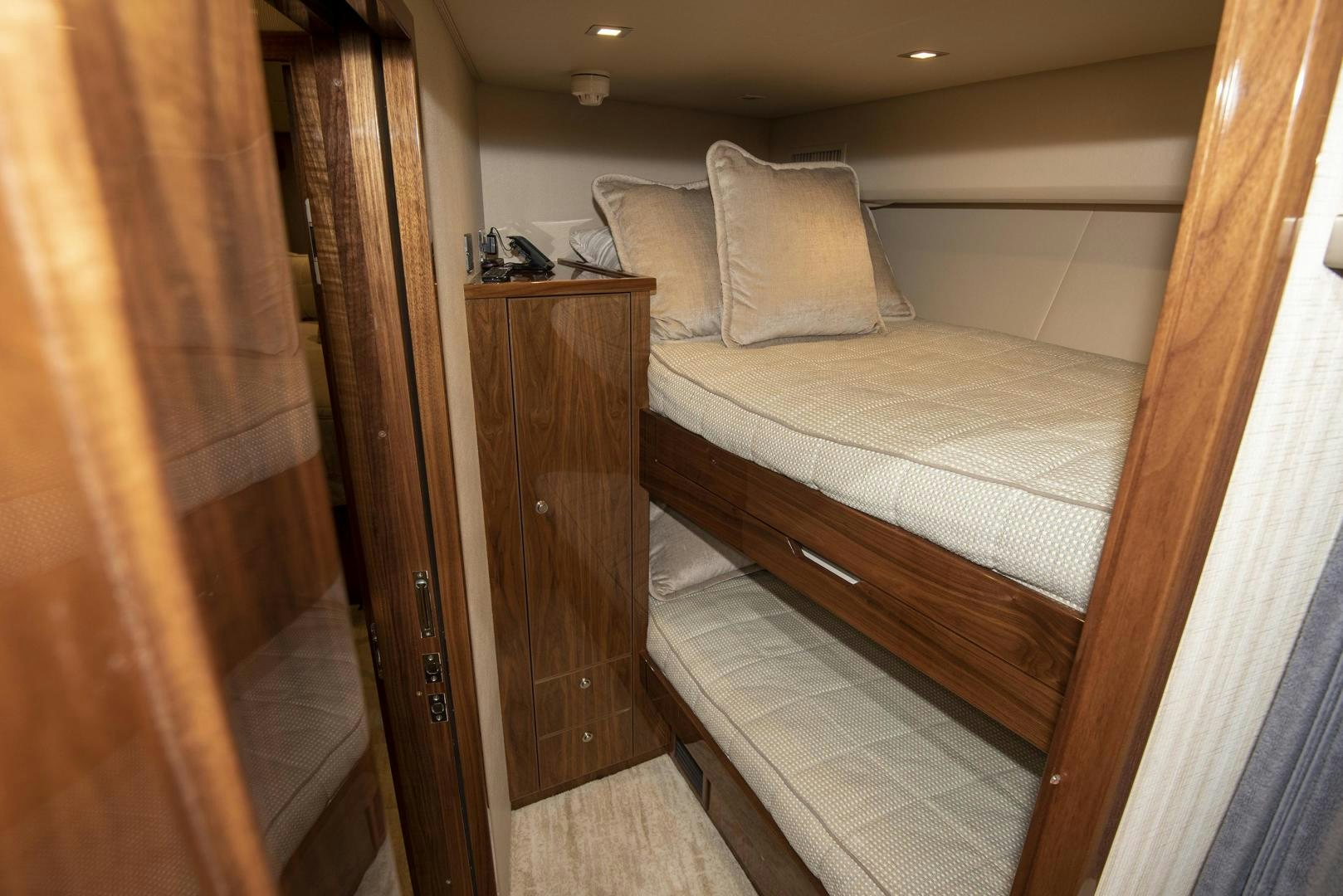 a bed in a room aboard TAG TEAM Yacht for Sale