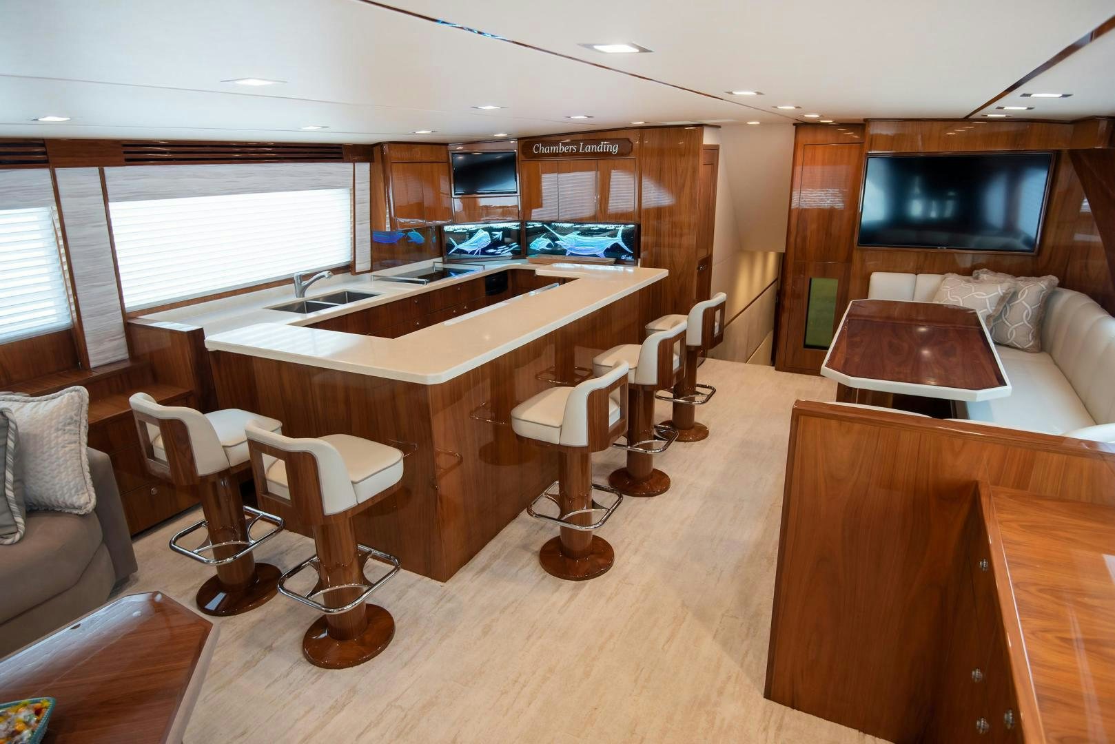 a room with a table and chairs aboard TAG TEAM Yacht for Sale