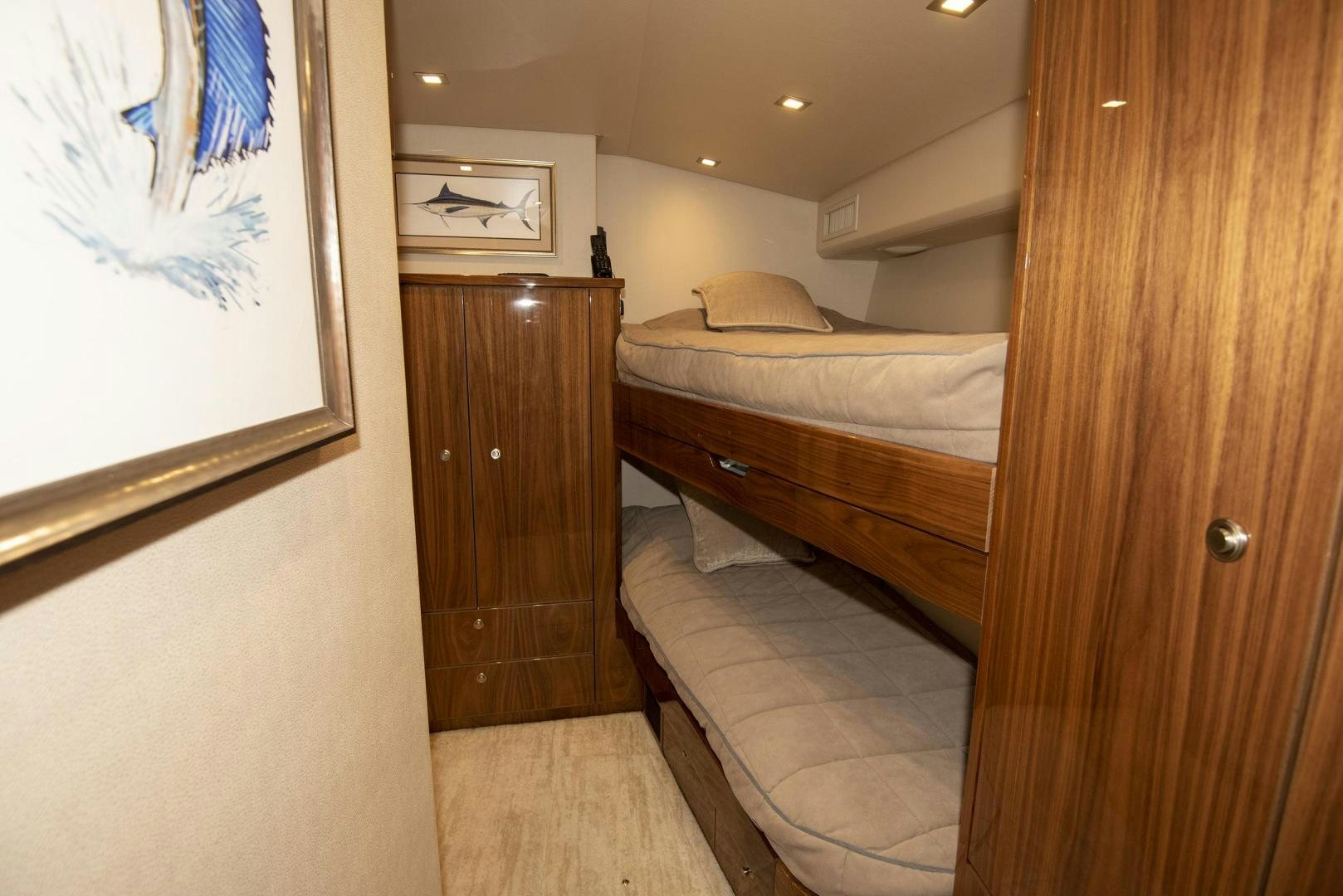 a room with a bed and a closet aboard TAG TEAM Yacht for Sale