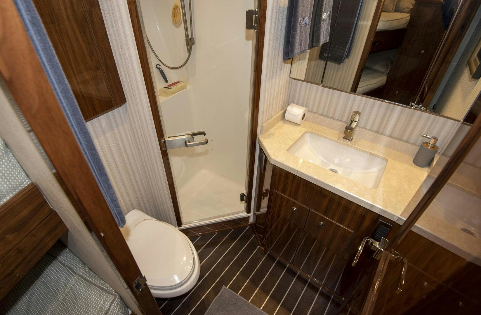 a bathroom with a sink and a toilet aboard TAG TEAM Yacht for Sale