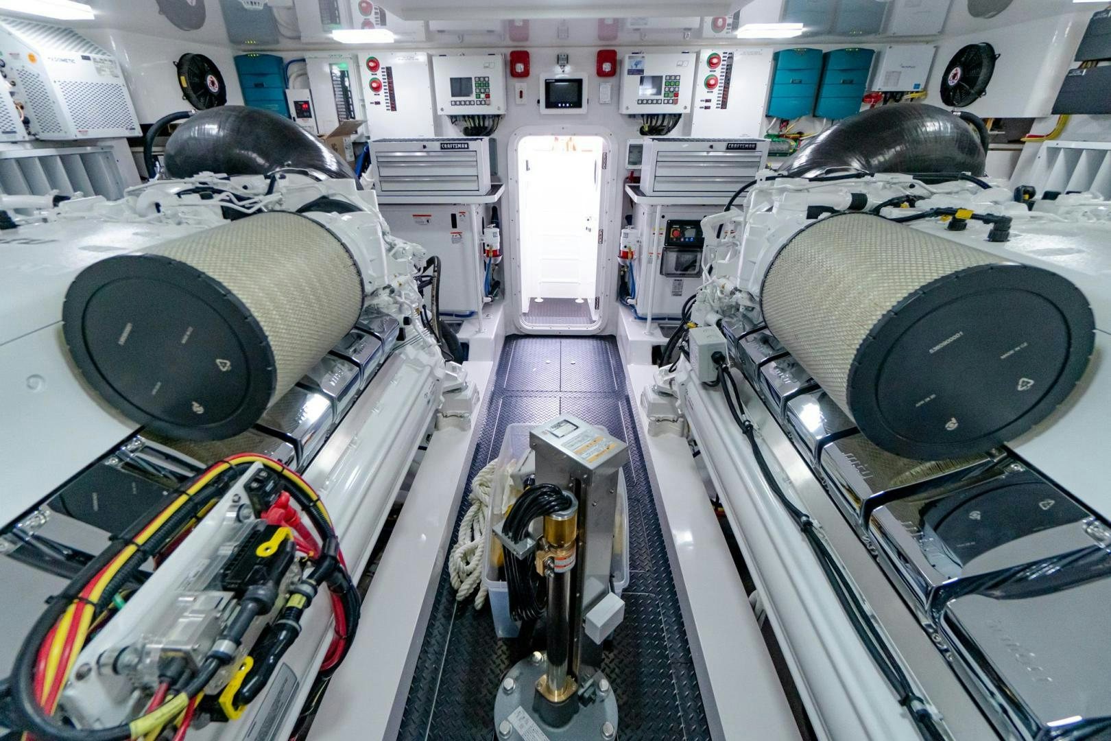 a large machine with large wheels aboard TAG TEAM Yacht for Sale
