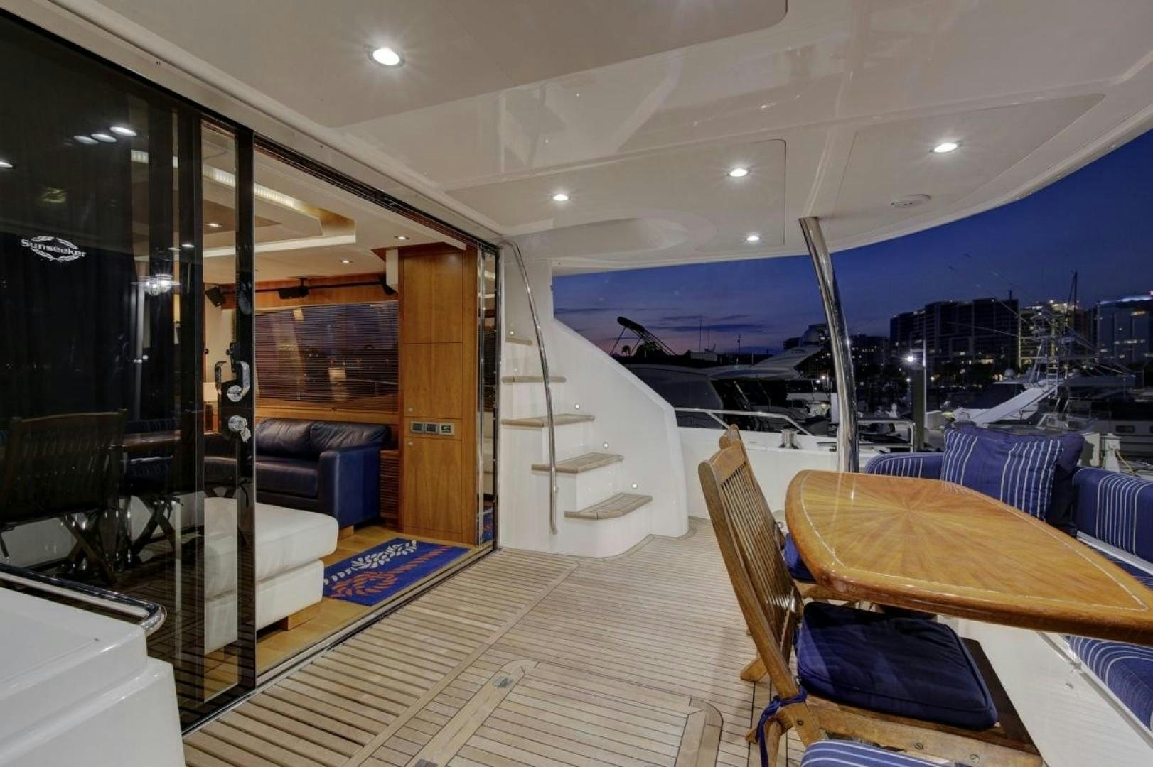 inside of a building with a pool table and chairs aboard SEA C Yacht for Sale