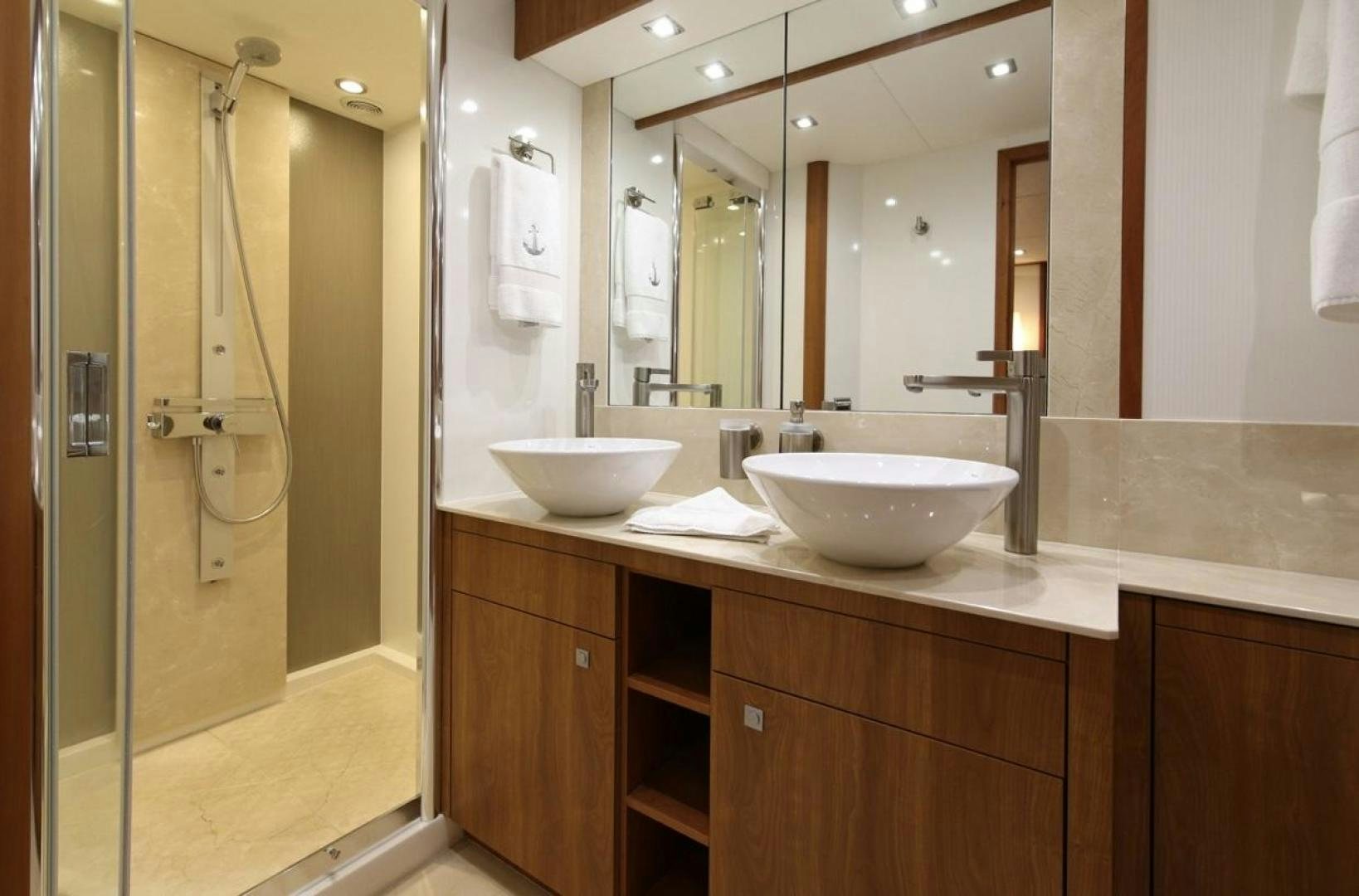 a bathroom with a sink and a shower aboard SEA C Yacht for Sale