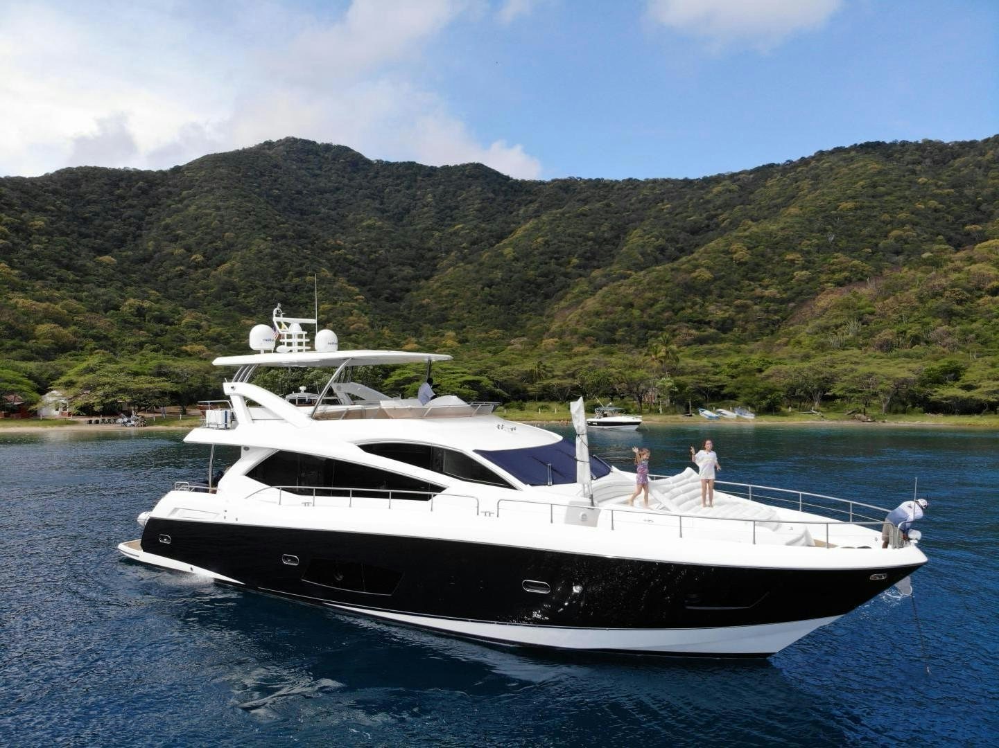 a couple people on a boat aboard SEA C Yacht for Sale