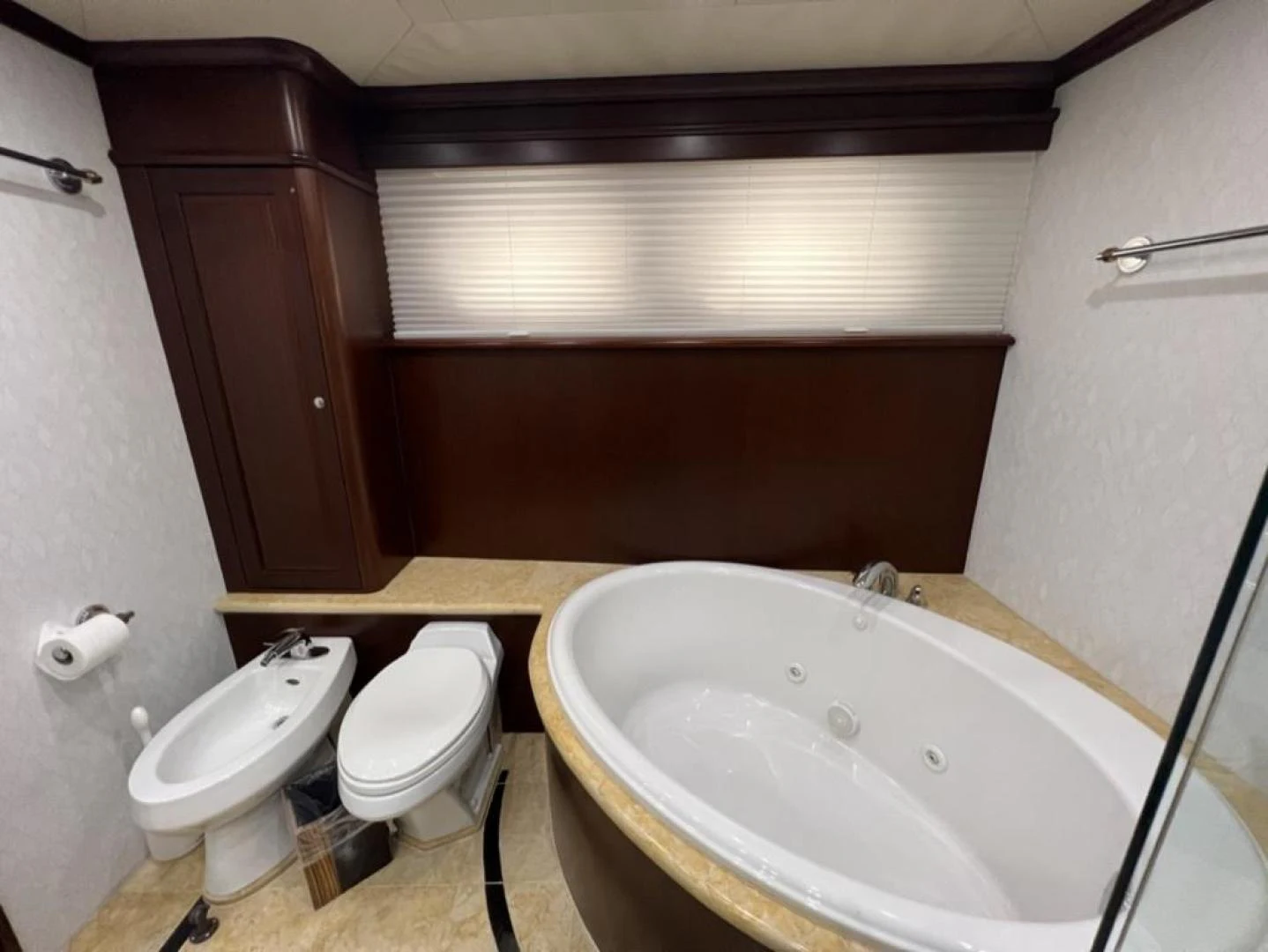 a bathroom with a tub sink and toilet aboard SELQET Yacht for Sale