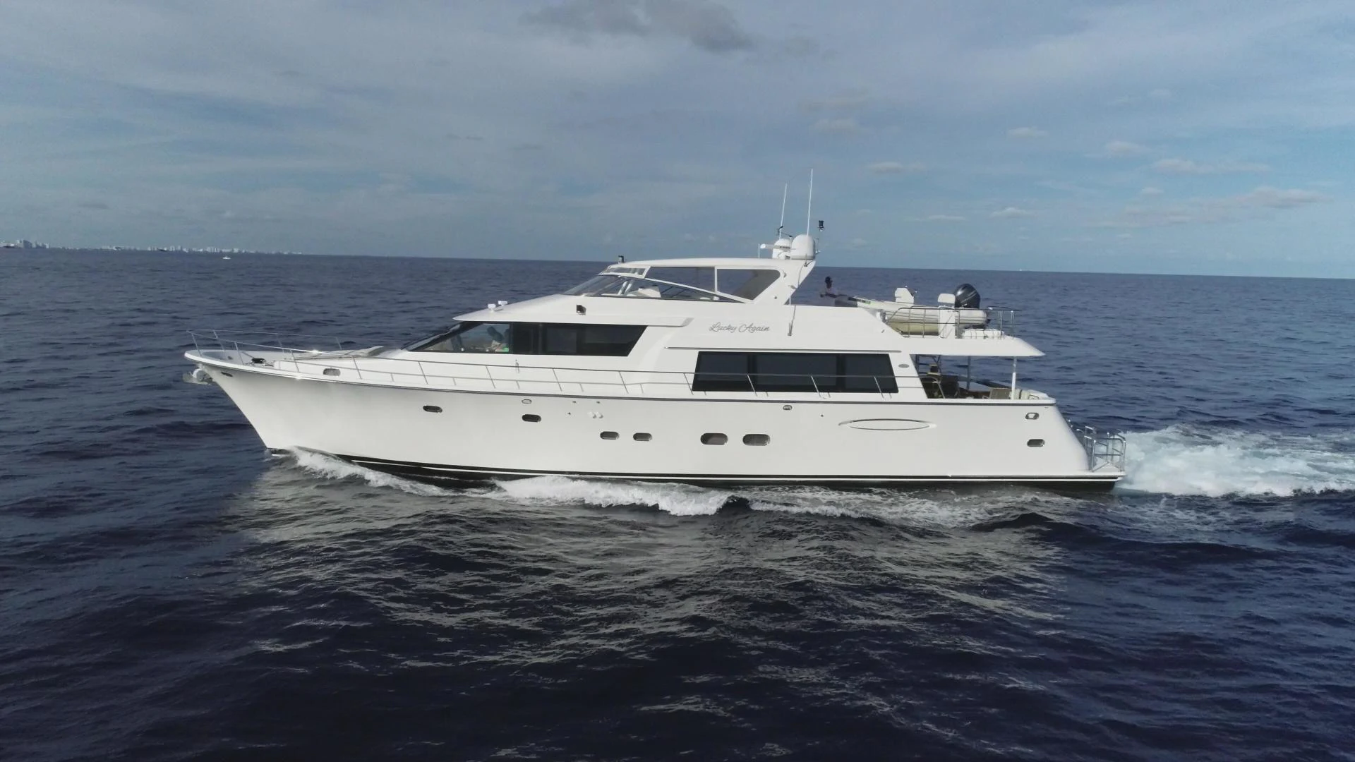 a white yacht in the water aboard SELQET Yacht for Sale