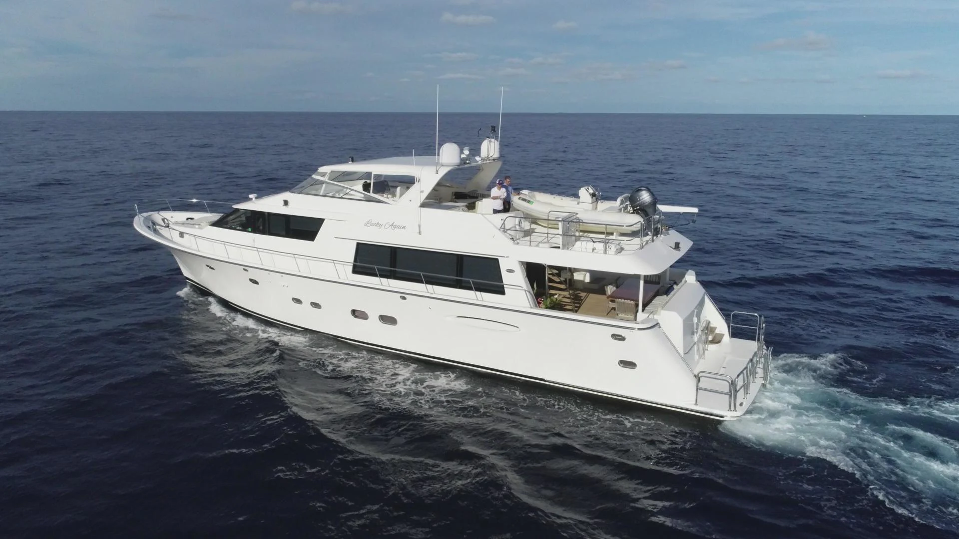 a white yacht in the water aboard SELQET Yacht for Sale