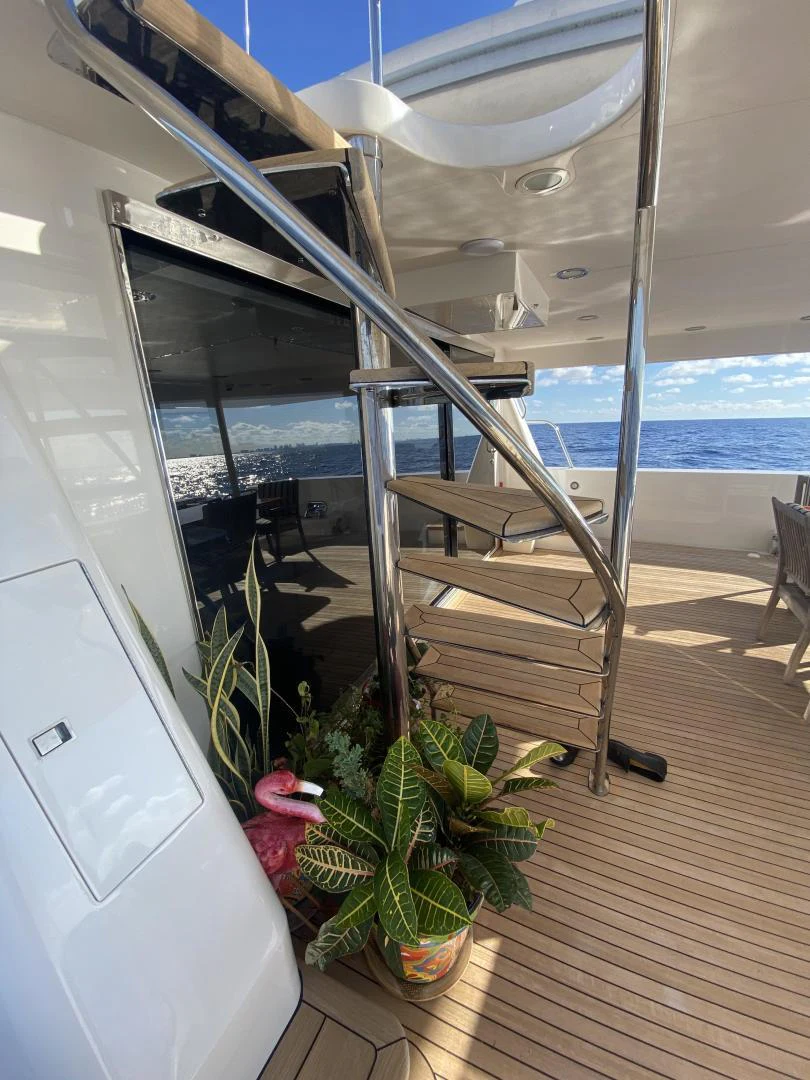 a glass door leading to a balcony aboard SELQET Yacht for Sale