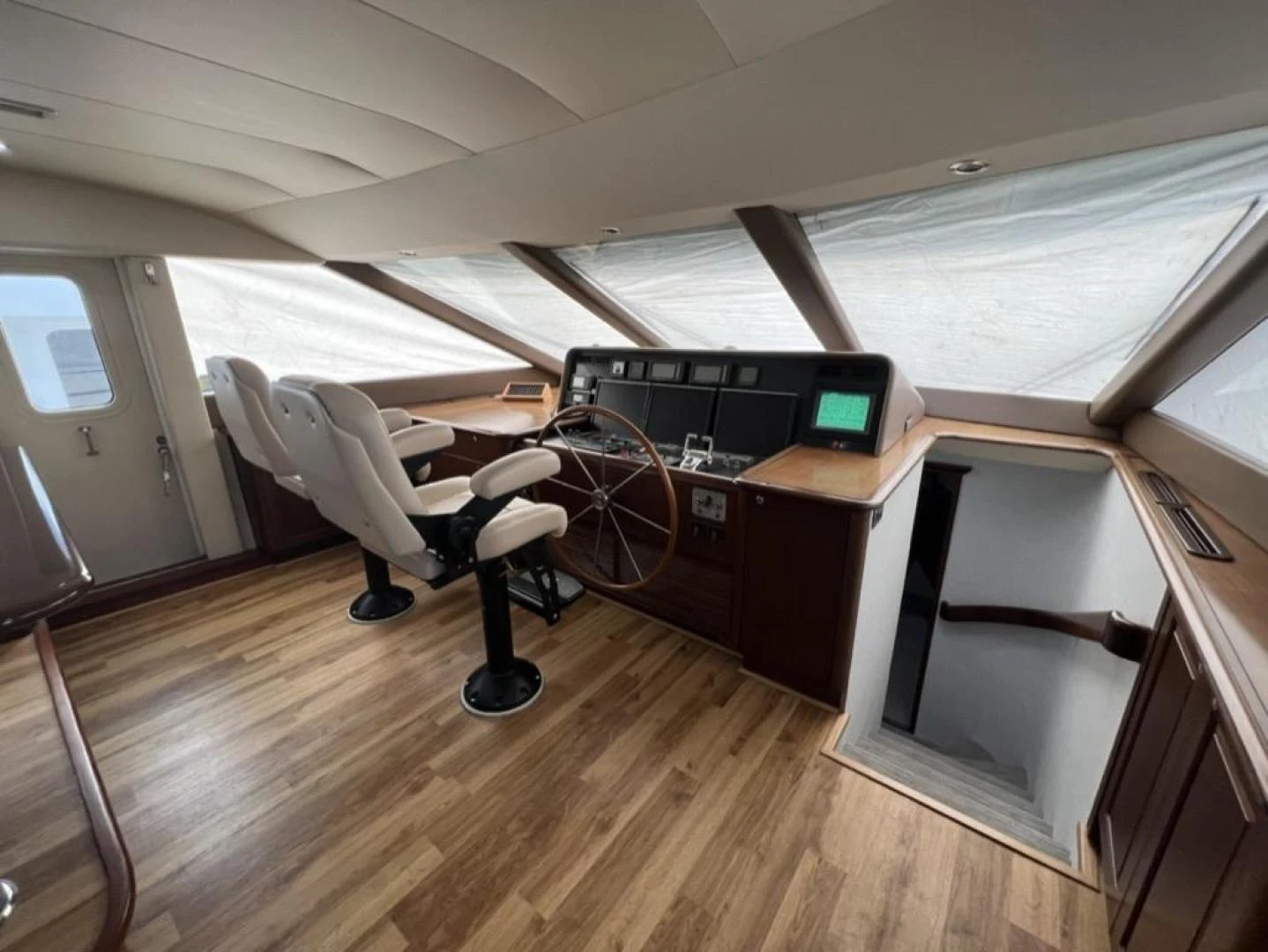 a room with a desk and a chair in it aboard SELQET Yacht for Sale