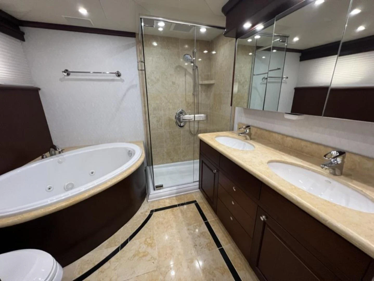 a bathroom with a large tub aboard SELQET Yacht for Sale