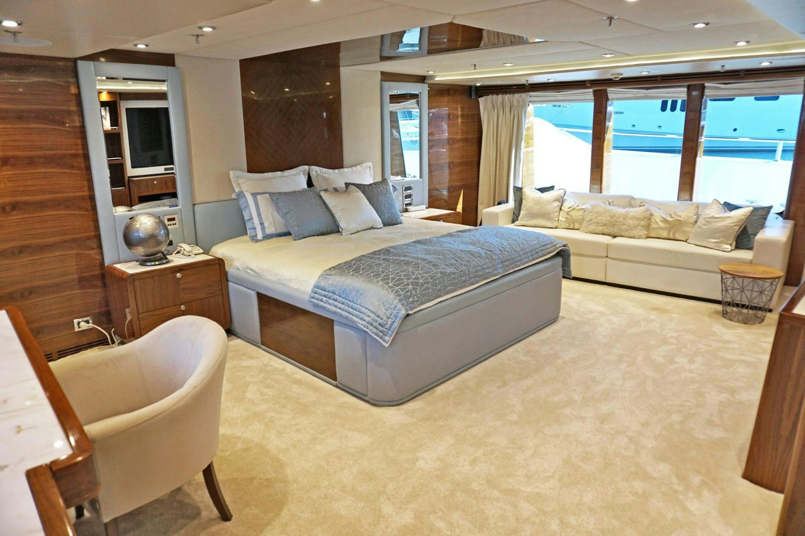a large bedroom with a large bed aboard SOJO Yacht for Sale