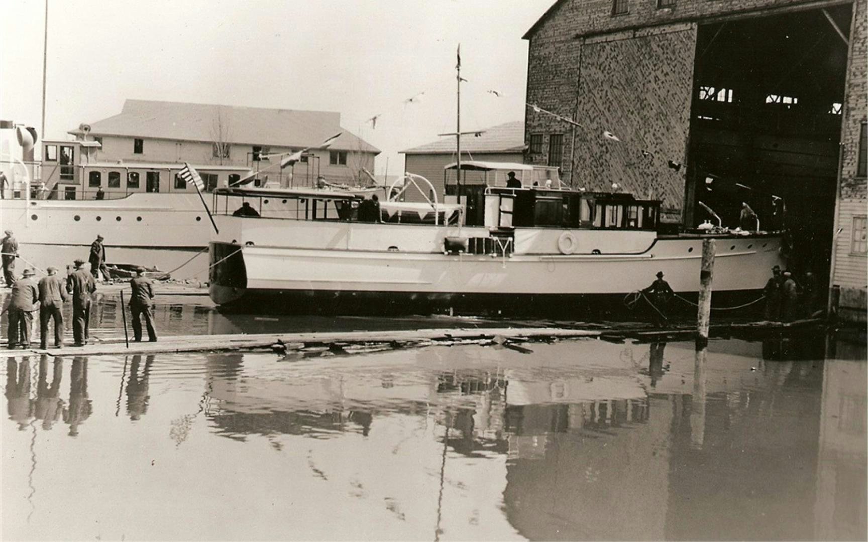 a boat is parked in the water aboard SCOUT Yacht for Sale