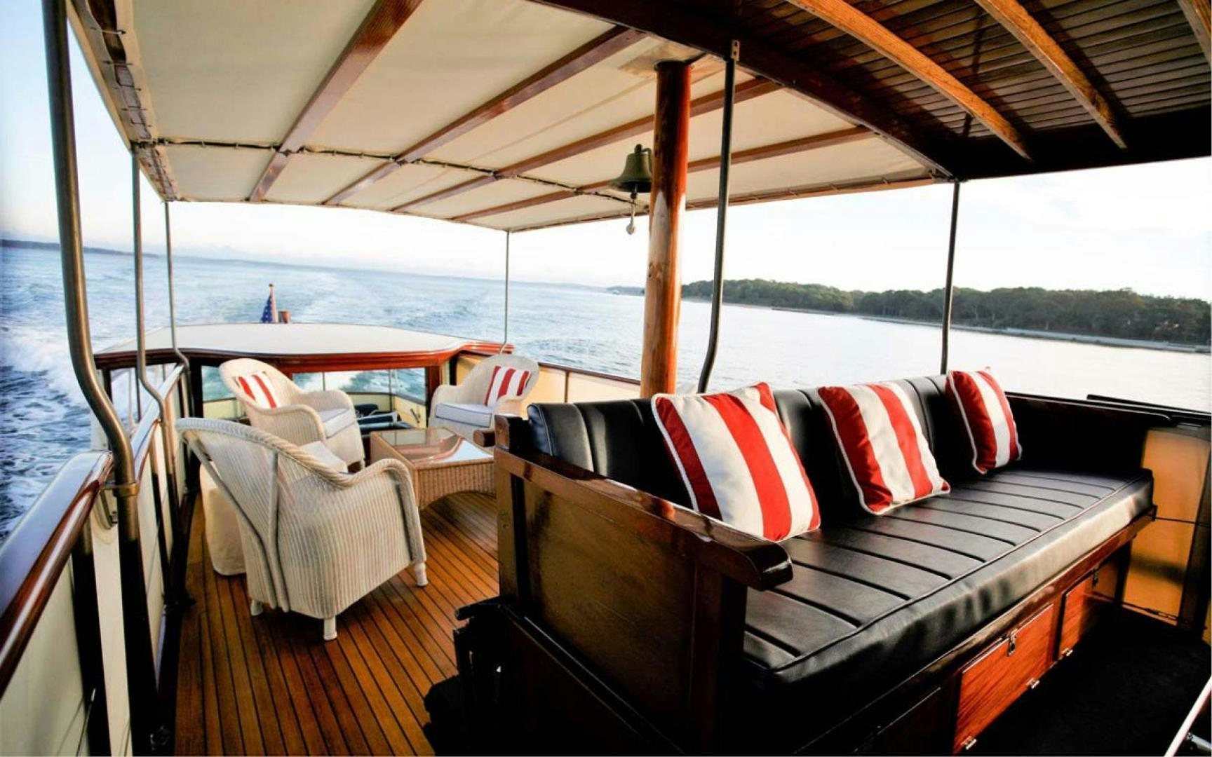 a boat with pillows on the deck aboard SCOUT Yacht for Sale